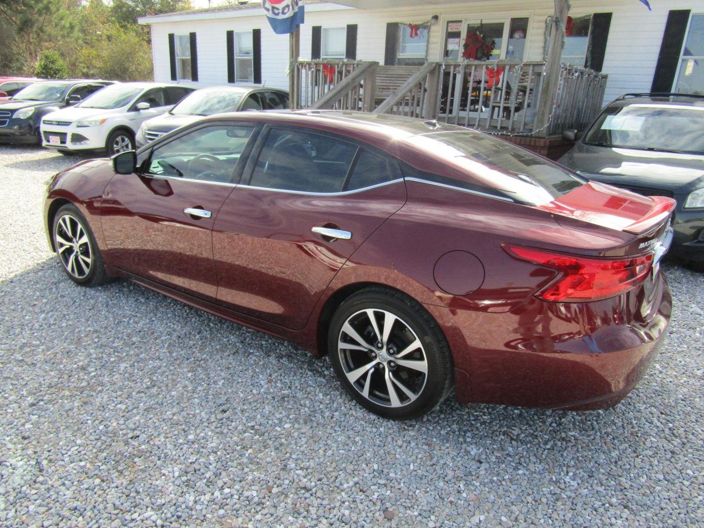 2016 Red Nissan Maxima 3.5 S (1N4AA6AP1GC) with an 3.5L V6 DOHC 24V engine, Automatic transmission, located at 15016 S Hwy 231, Midland City, AL, 36350, (334) 983-3001, 31.306210, -85.495277 - Photo#5