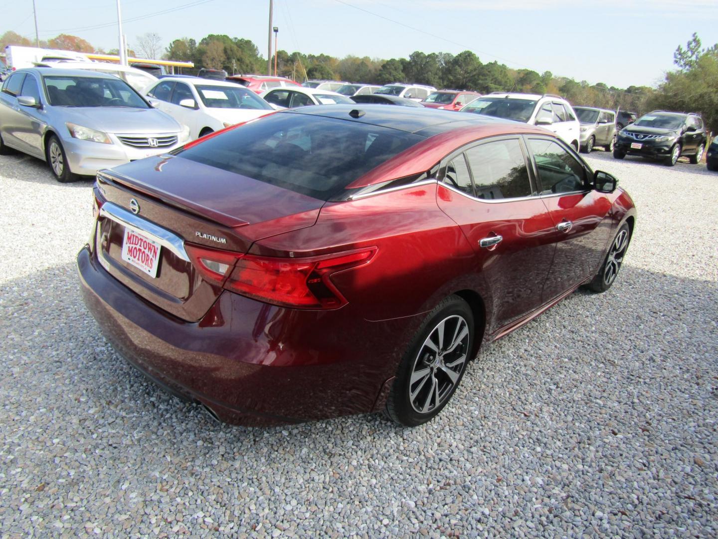 2016 Red Nissan Maxima 3.5 S (1N4AA6AP1GC) with an 3.5L V6 DOHC 24V engine, Automatic transmission, located at 15016 S Hwy 231, Midland City, AL, 36350, (334) 983-3001, 31.306210, -85.495277 - Photo#6