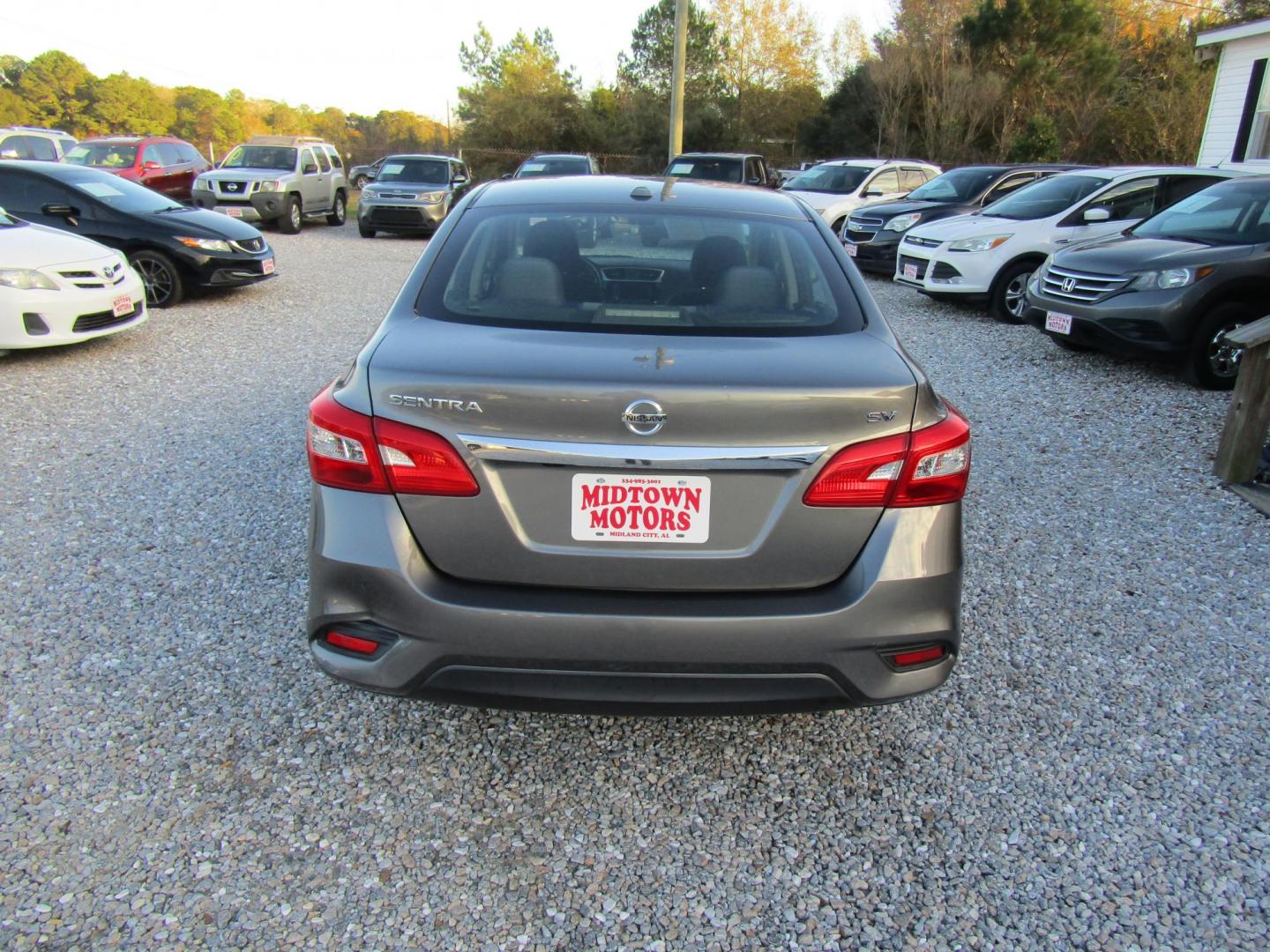 2019 Gray Nissan Sentra S CVT (3N1AB7AP9KY) with an 1.8L L4 SFI DOHC 16V engine, Automatic transmission, located at 15016 S Hwy 231, Midland City, AL, 36350, (334) 983-3001, 31.306210, -85.495277 - Photo#5