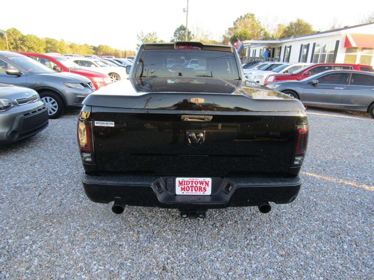2014 Black RAM 1500 Tradesman Quad Cab 2WD (1C6RR6FT4ES) with an 5.7L V8 OHV 16V engine, Automatic transmission, located at 15016 S Hwy 231, Midland City, AL, 36350, (334) 983-3001, 31.306210, -85.495277 - Photo#5