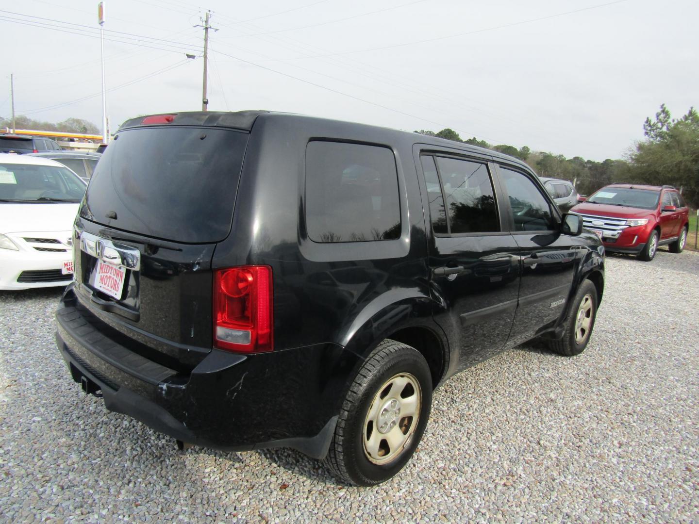 2013 Black Honda Pilot LX 2WD 5-Spd AT (5FNYF3H20DB) with an 3.5L V6 SOHC 24V engine, Automatic transmission, located at 15016 S Hwy 231, Midland City, AL, 36350, (334) 983-3001, 31.306210, -85.495277 - Photo#6