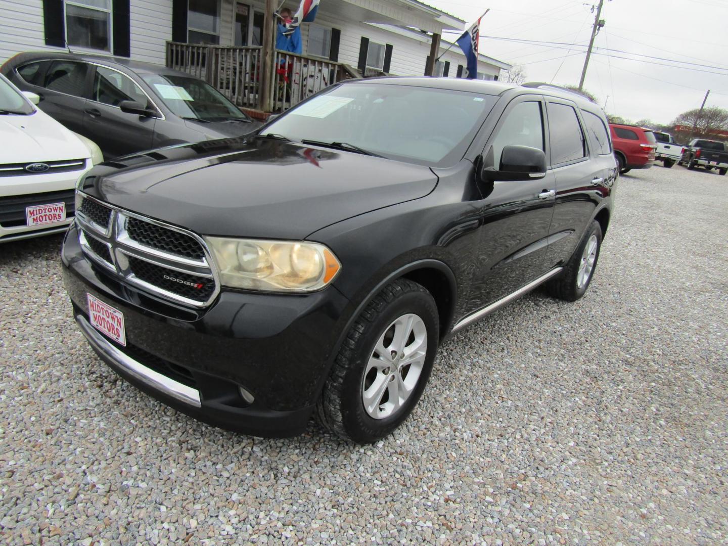 2013 Black Dodge Durango Crew 2WD (1C4RDHDG6DC) with an 3.6L V6 DOHC 24V engine, Automatic transmission, located at 15016 S Hwy 231, Midland City, AL, 36350, (334) 983-3001, 31.306210, -85.495277 - Photo#1