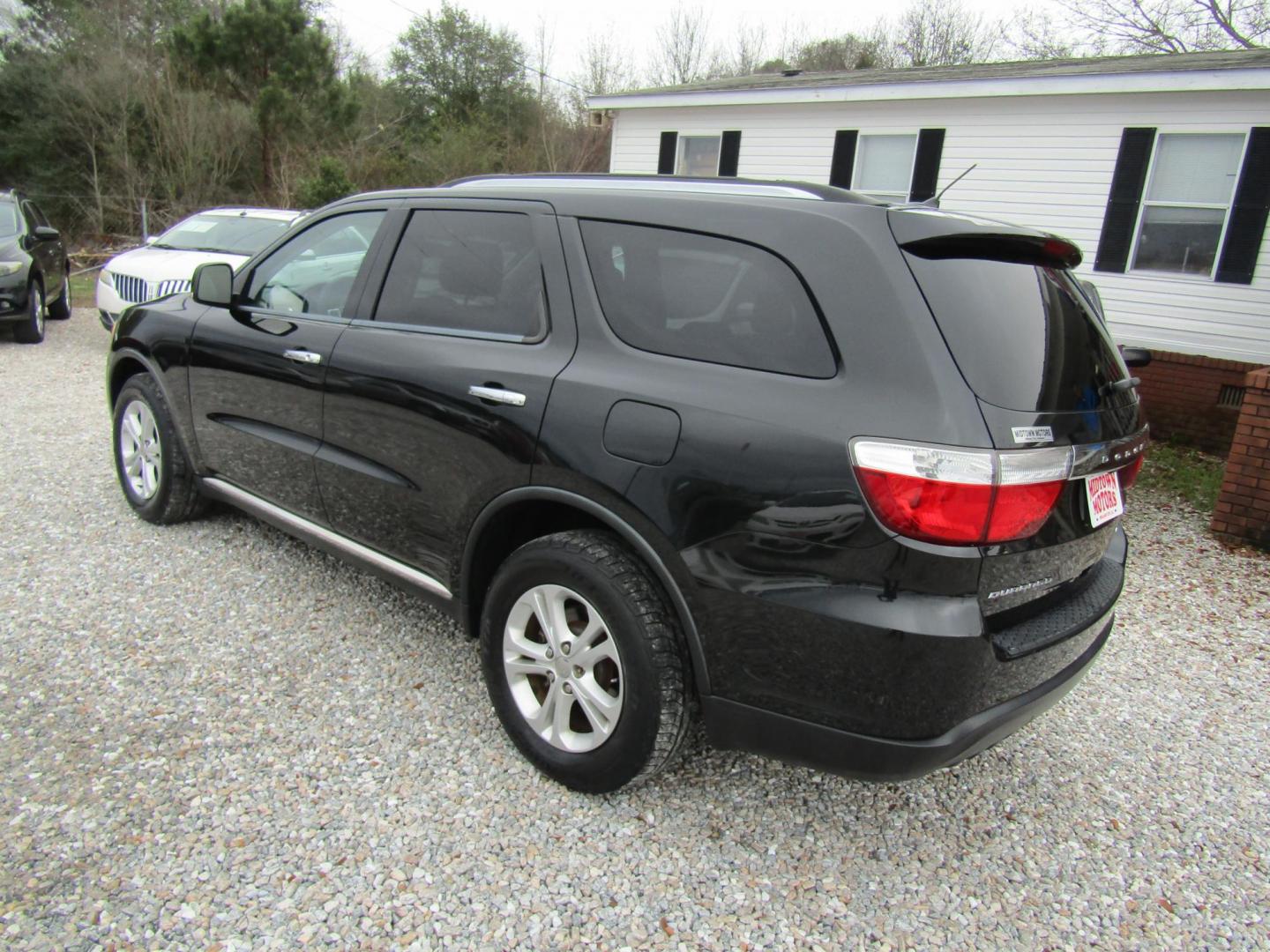2013 Black Dodge Durango Crew 2WD (1C4RDHDG6DC) with an 3.6L V6 DOHC 24V engine, Automatic transmission, located at 15016 S Hwy 231, Midland City, AL, 36350, (334) 983-3001, 31.306210, -85.495277 - Photo#4