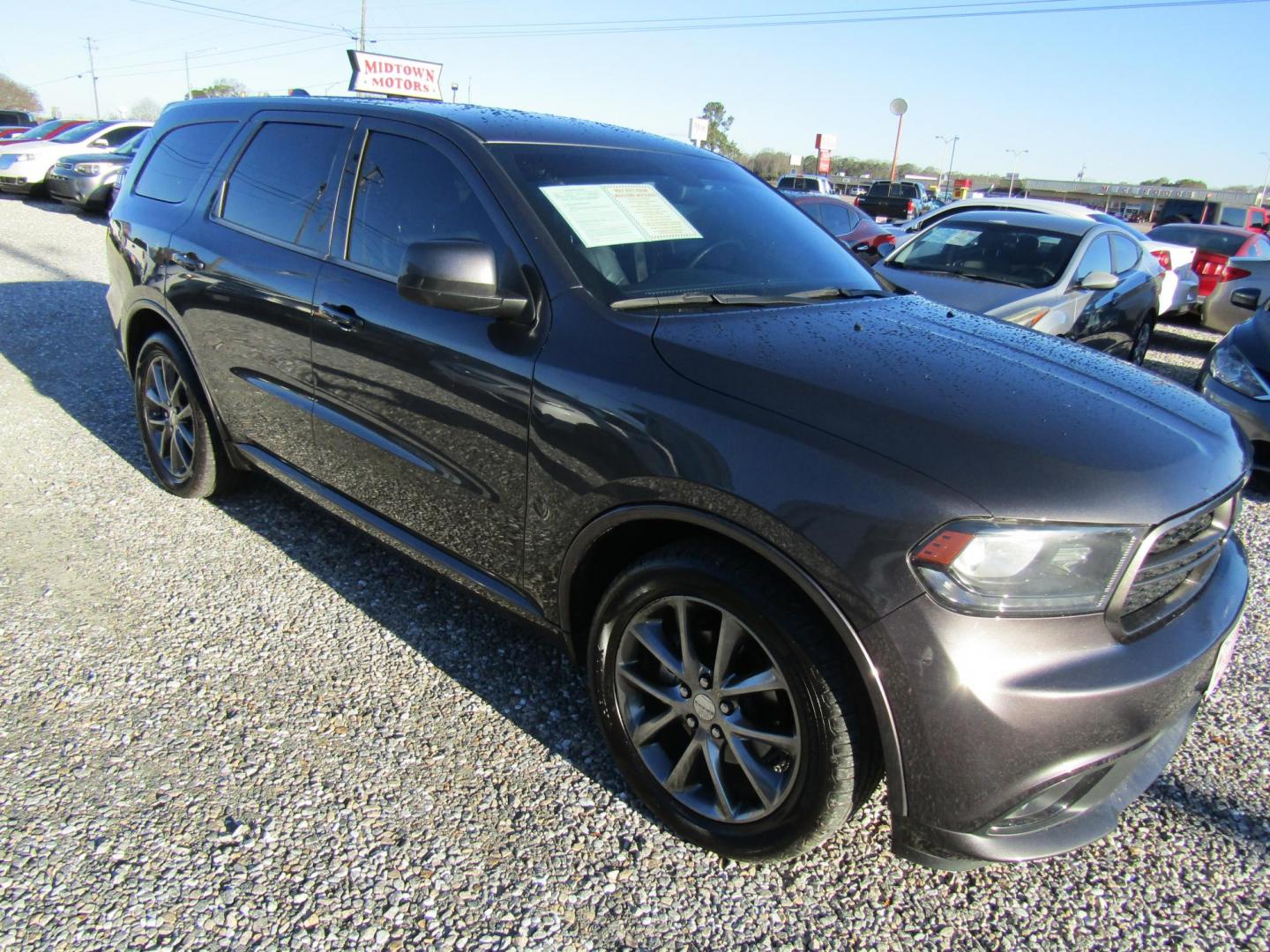 2015 Gray Dodge Durango SXT RWD (1C4RDHAG5FC) with an 3.6L V6 DOHC 24V engine, Automatic transmission, located at 15016 S Hwy 231, Midland City, AL, 36350, (334) 983-3001, 31.306210, -85.495277 - Photo#0