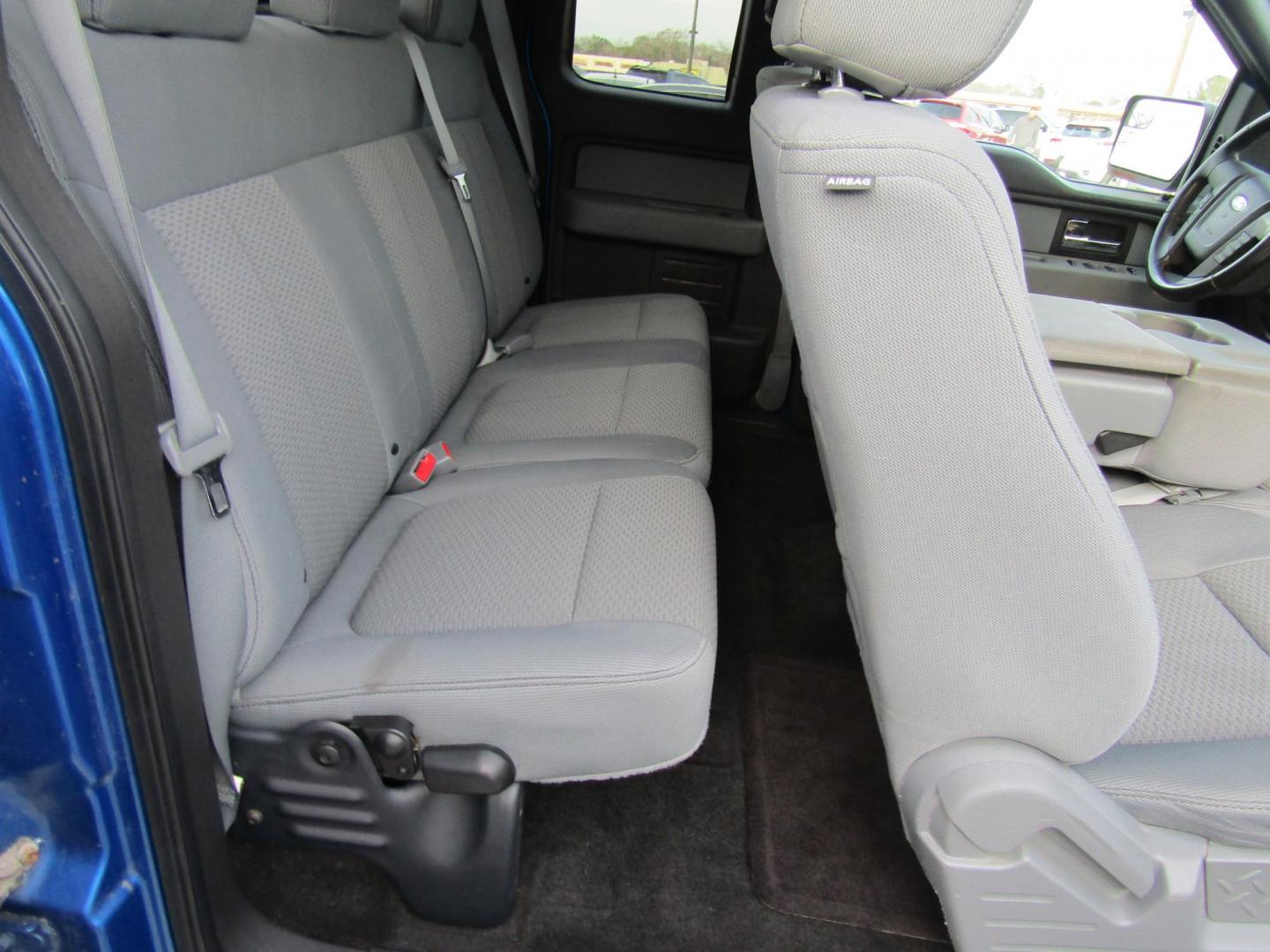 2012 Blue Ford F-150 Lariat SuperCab 6.5-ft. Bed 4WD (1FTFX1EF1CF) with an 5.0L V8 engine, Automatic transmission, located at 15016 S Hwy 231, Midland City, AL, 36350, (334) 983-3001, 31.306210, -85.495277 - Photo#8