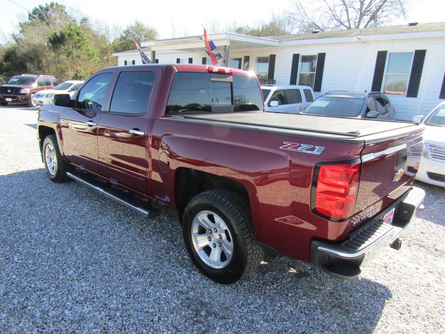 2015 Red Chevrolet Silverado 1500 LT Crew Cab 4WD (3GCUKRECXFG) with an 5.3L V8 OHV 16V engine, Automatic transmission, located at 15016 S Hwy 231, Midland City, AL, 36350, (334) 983-3001, 31.306210, -85.495277 - Photo#2