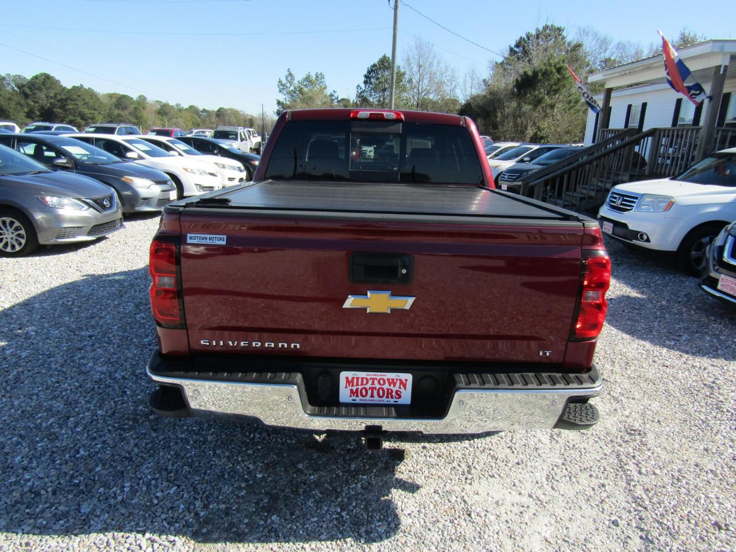 2015 Red Chevrolet Silverado 1500 LT Crew Cab 4WD (3GCUKRECXFG) with an 5.3L V8 OHV 16V engine, Automatic transmission, located at 15016 S Hwy 231, Midland City, AL, 36350, (334) 983-3001, 31.306210, -85.495277 - Photo#6