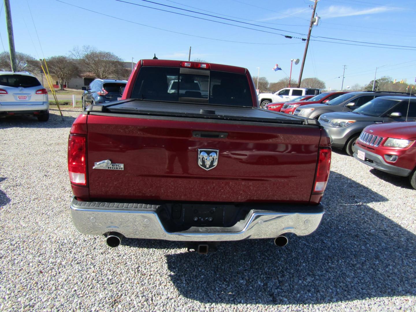 2015 Red RAM 1500 SLT Crew Cab SWB 2WD (1C6RR6LT6FS) with an 5.7L V8 OHV 16V engine, Automatic transmission, located at 15016 S Hwy 231, Midland City, AL, 36350, (334) 983-3001, 31.306210, -85.495277 - Photo#5