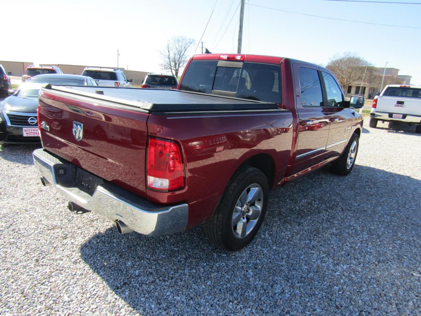 2015 Red RAM 1500 SLT Crew Cab SWB 2WD (1C6RR6LT6FS) with an 5.7L V8 OHV 16V engine, Automatic transmission, located at 15016 S Hwy 231, Midland City, AL, 36350, (334) 983-3001, 31.306210, -85.495277 - Photo#6
