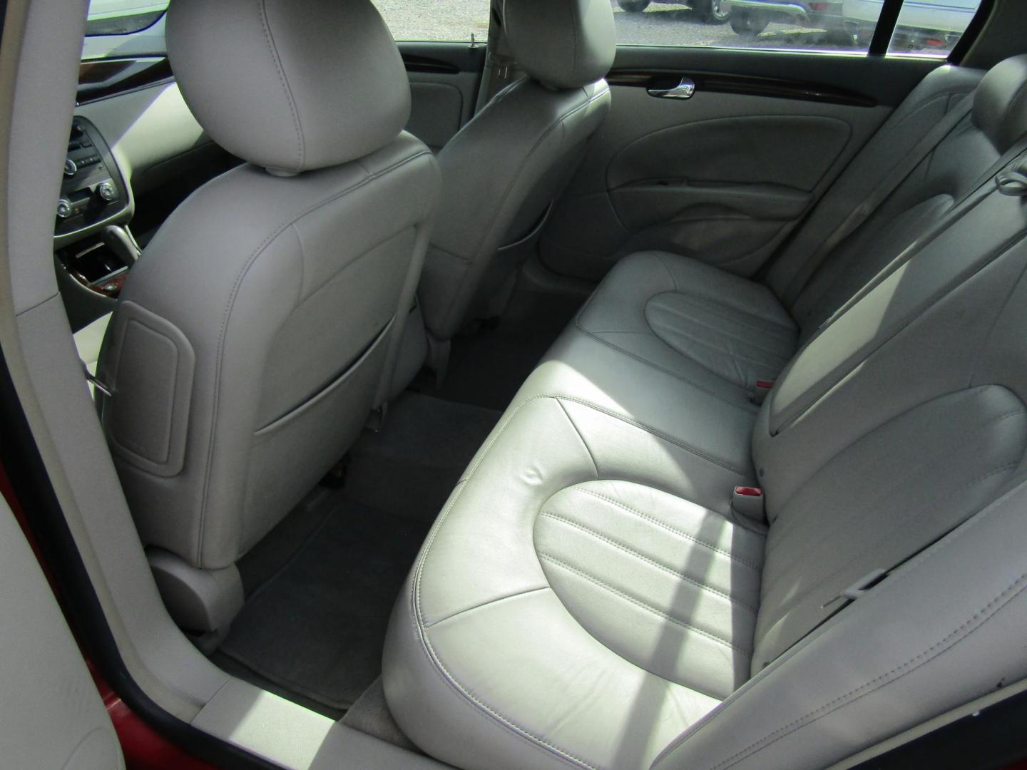 2010 Red Buick Lucerne CXL (1G4HC5EM3AU) with an 3.9L V6 OHV 12V engine, Automatic transmission, located at 15016 S Hwy 231, Midland City, AL, 36350, (334) 983-3001, 31.306210, -85.495277 - Photo#4