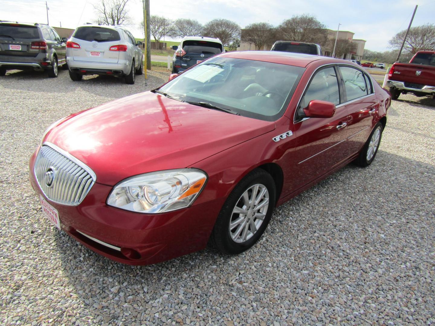 2010 Red Buick Lucerne CXL (1G4HC5EM3AU) with an 3.9L V6 OHV 12V engine, Automatic transmission, located at 15016 S Hwy 231, Midland City, AL, 36350, (334) 983-3001, 31.306210, -85.495277 - Photo#2