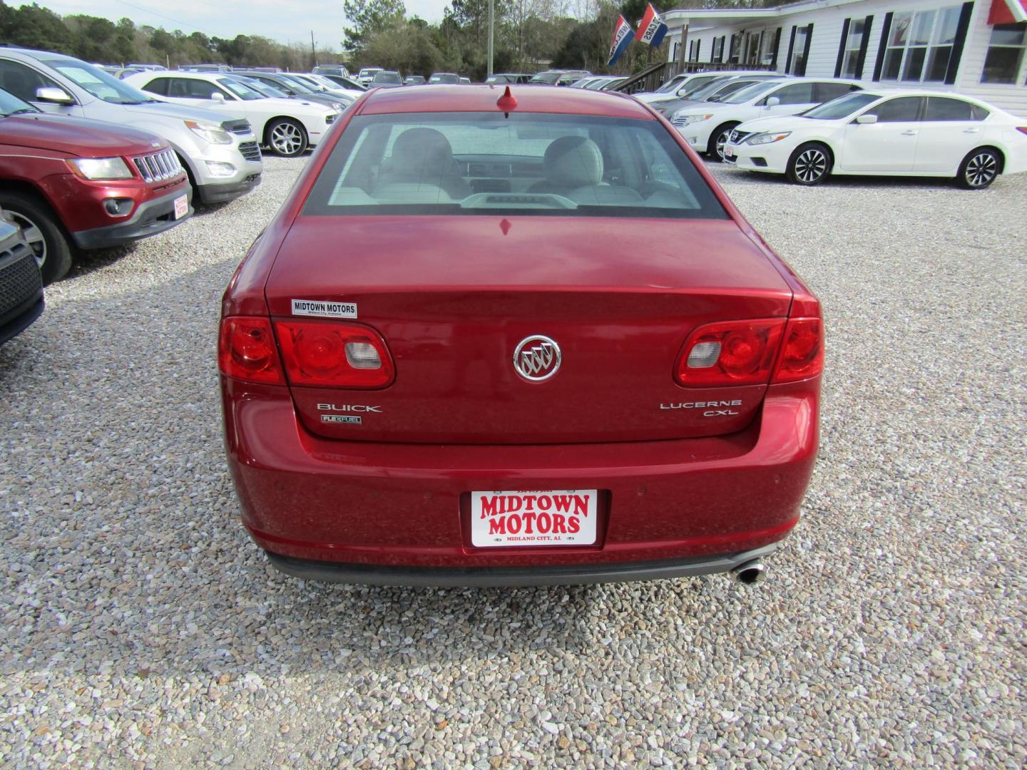 2010 Red Buick Lucerne CXL (1G4HC5EM3AU) with an 3.9L V6 OHV 12V engine, Automatic transmission, located at 15016 S Hwy 231, Midland City, AL, 36350, (334) 983-3001, 31.306210, -85.495277 - Photo#6