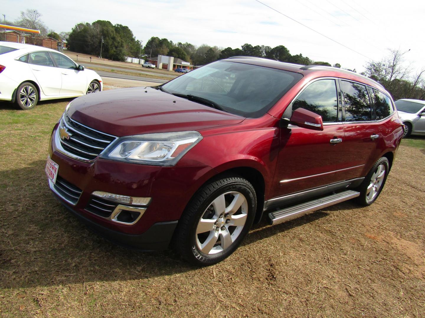 2015 Red Chevrolet Traverse LTZ FWD (1GNKRJKDXFJ) with an 3.6L V6 DOHC 24V engine, Automatic transmission, located at 15016 S Hwy 231, Midland City, AL, 36350, (334) 983-3001, 31.306210, -85.495277 - Photo#1
