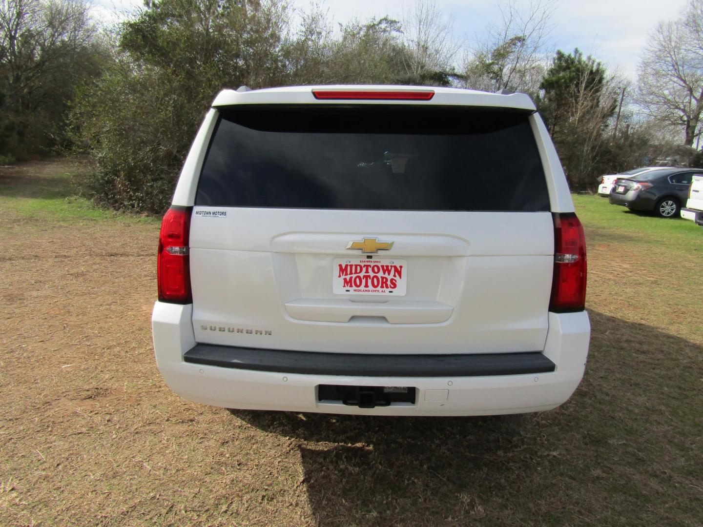 2016 White Chevrolet Suburban LT 2WD (1GNSCHKCXGR) with an 5.3L V8 OHV 16V engine, Automatic transmission, located at 15016 S Hwy 231, Midland City, AL, 36350, (334) 983-3001, 31.306210, -85.495277 - Photo#6