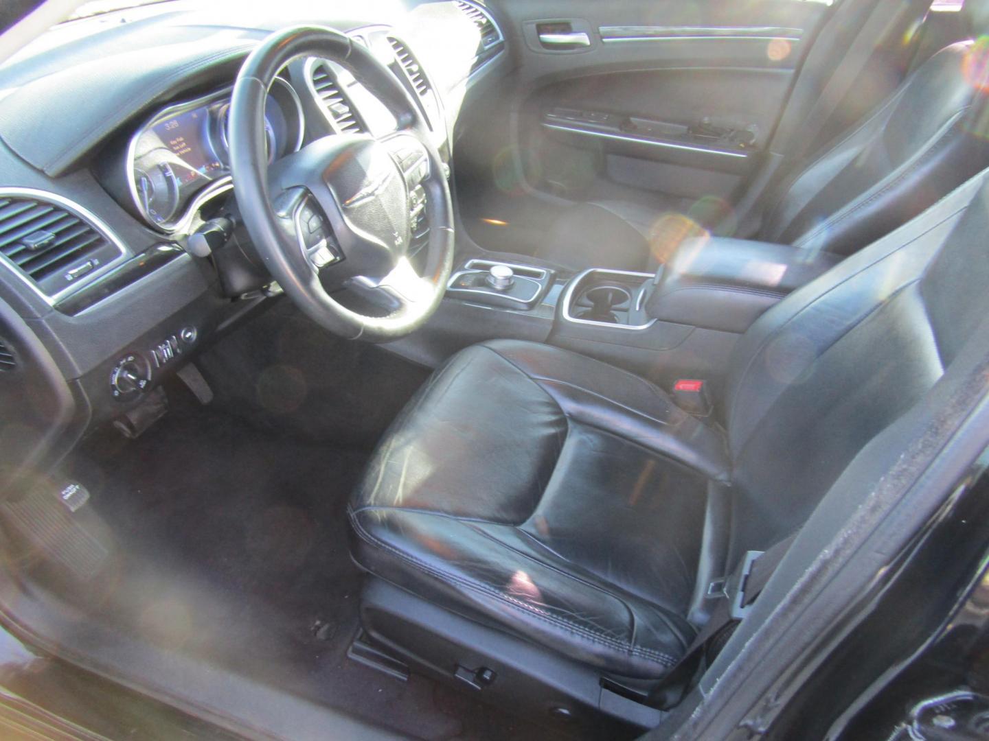 2016 Black Chrysler 300 Limited RWD (2C3CCAAG1GH) with an 3.6L V6 SOHC 24V engine, Automatic transmission, located at 15016 S Hwy 231, Midland City, AL, 36350, (334) 983-3001, 31.306210, -85.495277 - Photo#2