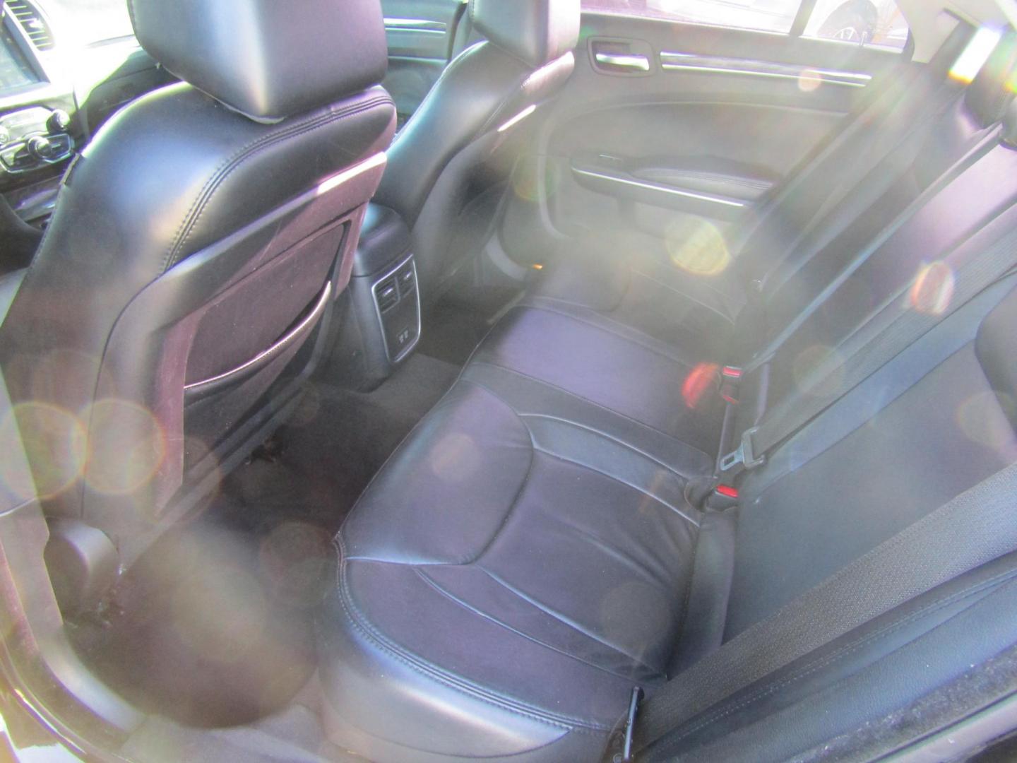 2016 Black Chrysler 300 Limited RWD (2C3CCAAG1GH) with an 3.6L V6 SOHC 24V engine, Automatic transmission, located at 15016 S Hwy 231, Midland City, AL, 36350, (334) 983-3001, 31.306210, -85.495277 - Photo#3