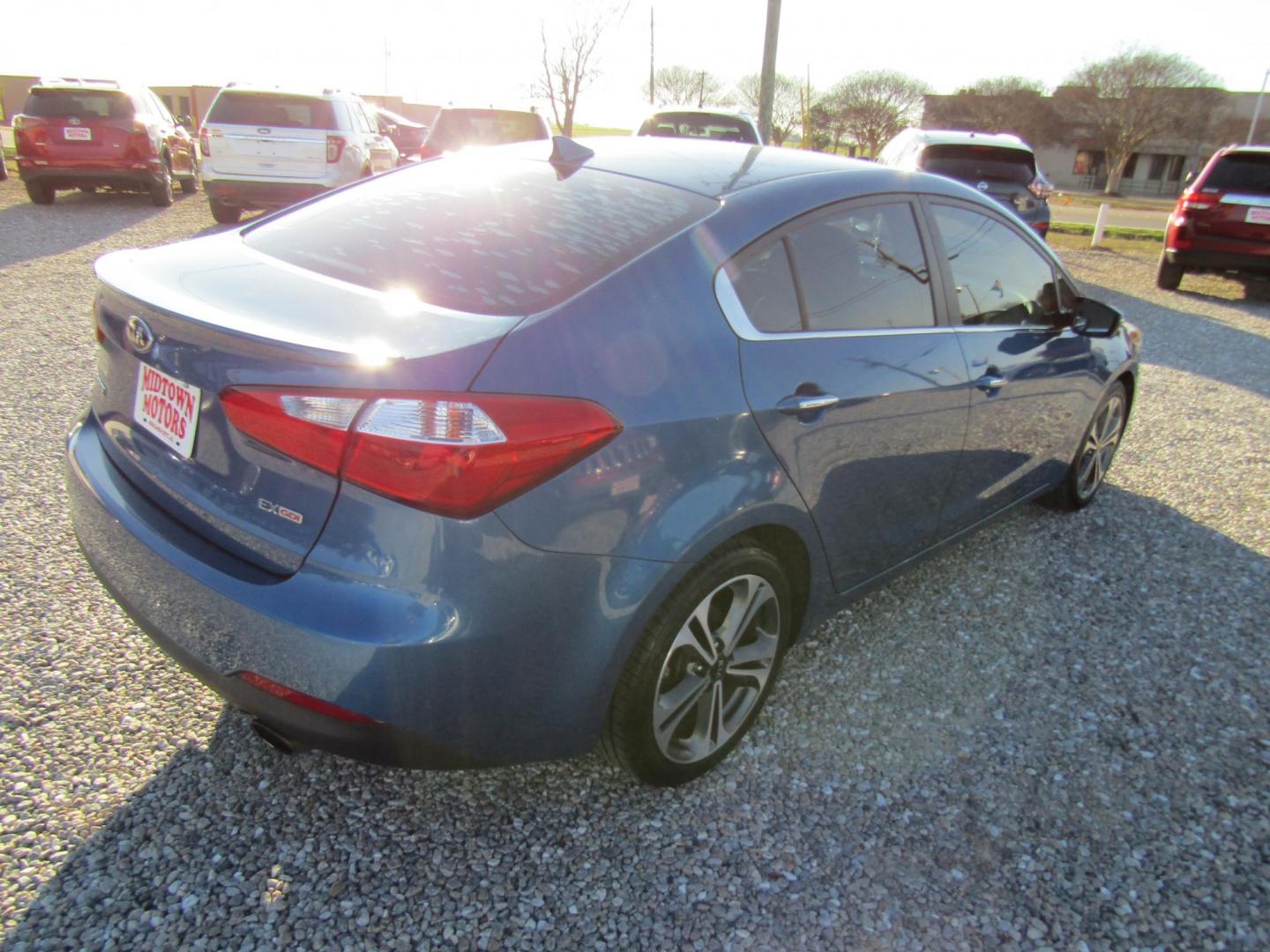 2015 Blue Kia Forte EX (KNAFX4A87F5) with an 2.0L L4 DOHC 16V engine, Automatic transmission, located at 15016 S Hwy 231, Midland City, AL, 36350, (334) 983-3001, 31.306210, -85.495277 - Photo#7