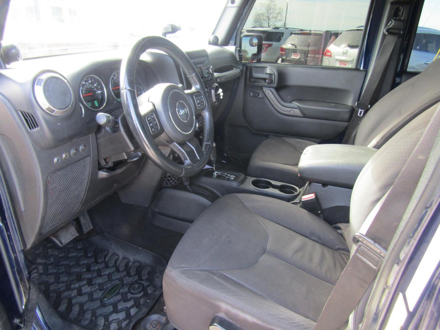 2013 Blue Jeep Wrangler Unlimited Sport 4WD (1C4BJWDGXDL) with an 3.6L V6 DOHC 24V FFV engine, Automatic transmission, located at 15016 S Hwy 231, Midland City, AL, 36350, (334) 983-3001, 31.306210, -85.495277 - Photo#3