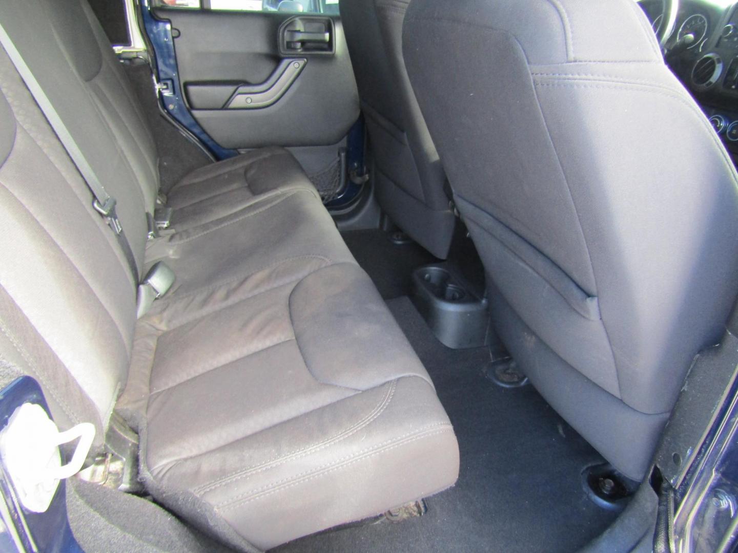 2013 Blue Jeep Wrangler Unlimited Sport 4WD (1C4BJWDGXDL) with an 3.6L V6 DOHC 24V FFV engine, Automatic transmission, located at 15016 S Hwy 231, Midland City, AL, 36350, (334) 983-3001, 31.306210, -85.495277 - Photo#8