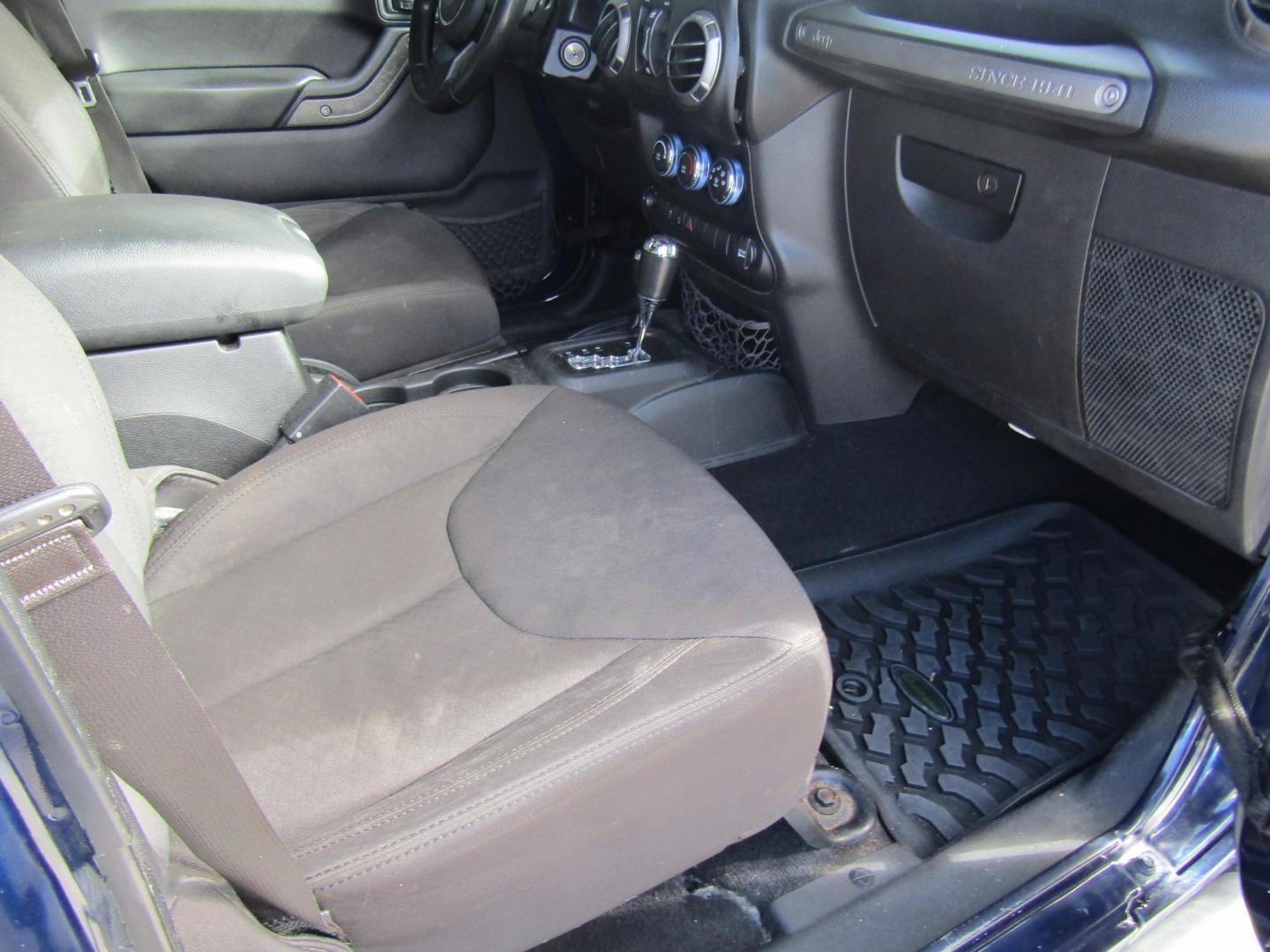 2013 Blue Jeep Wrangler Unlimited Sport 4WD (1C4BJWDGXDL) with an 3.6L V6 DOHC 24V FFV engine, Automatic transmission, located at 15016 S Hwy 231, Midland City, AL, 36350, (334) 983-3001, 31.306210, -85.495277 - Photo#9