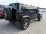 2013 Blue Jeep Wrangler Unlimited Sport 4WD (1C4BJWDGXDL) with an 3.6L V6 DOHC 24V FFV engine, Automatic transmission, located at 15016 S Hwy 231, Midland City, AL, 36350, (334) 983-3001, 31.306210, -85.495277 - Photo#7
