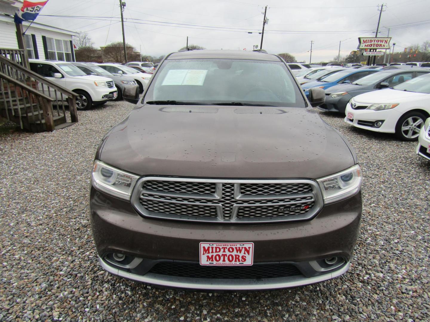 2017 BROWN Dodge Durango SXT RWD (1C4RDHAG2HC) with an 3.6L V6 DOHC 24V engine, Automatic transmission, located at 15016 S Hwy 231, Midland City, AL, 36350, (334) 983-3001, 31.306210, -85.495277 - Photo#1