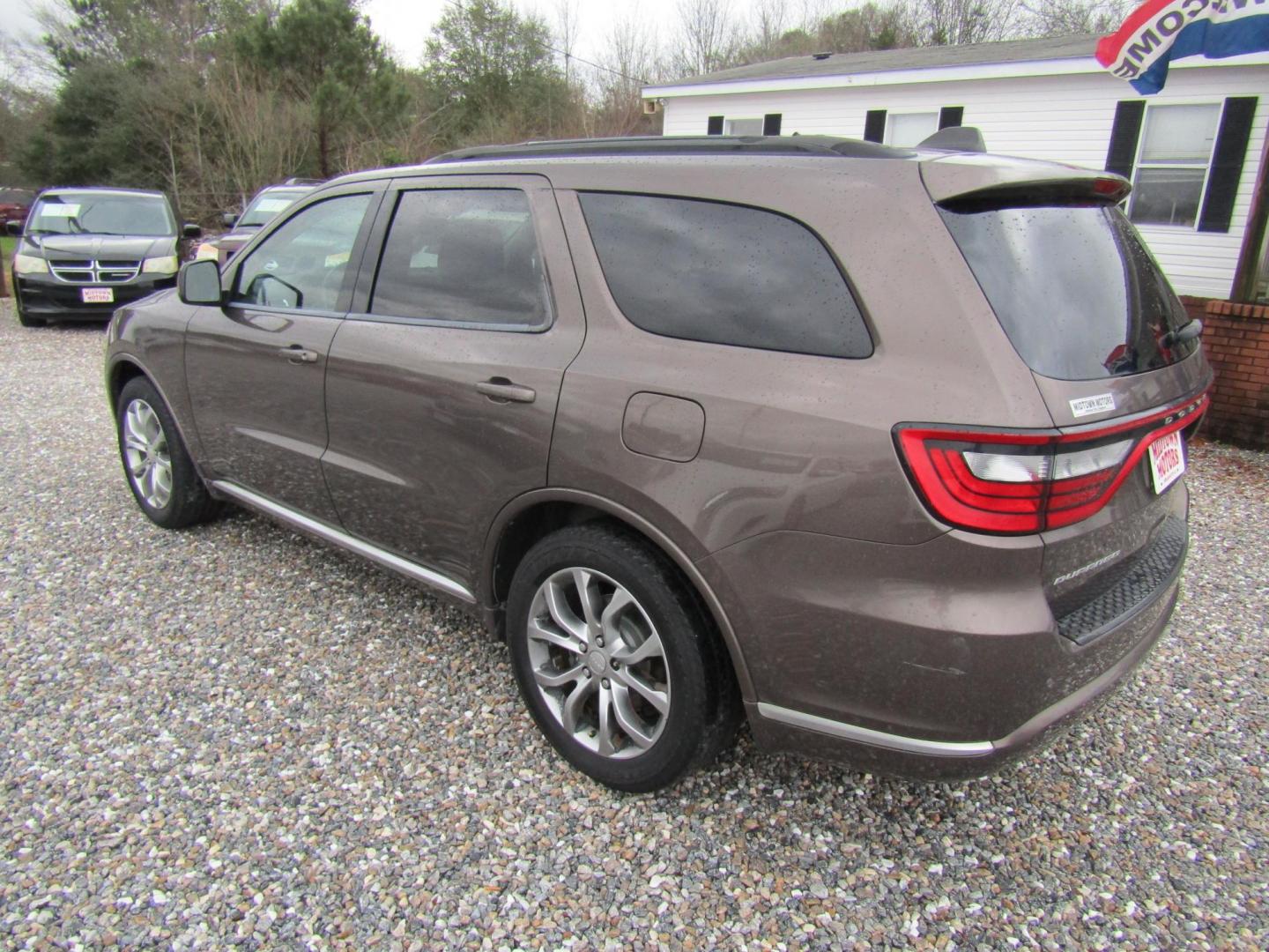 2017 BROWN Dodge Durango SXT RWD (1C4RDHAG2HC) with an 3.6L V6 DOHC 24V engine, Automatic transmission, located at 15016 S Hwy 231, Midland City, AL, 36350, (334) 983-3001, 31.306210, -85.495277 - Photo#5