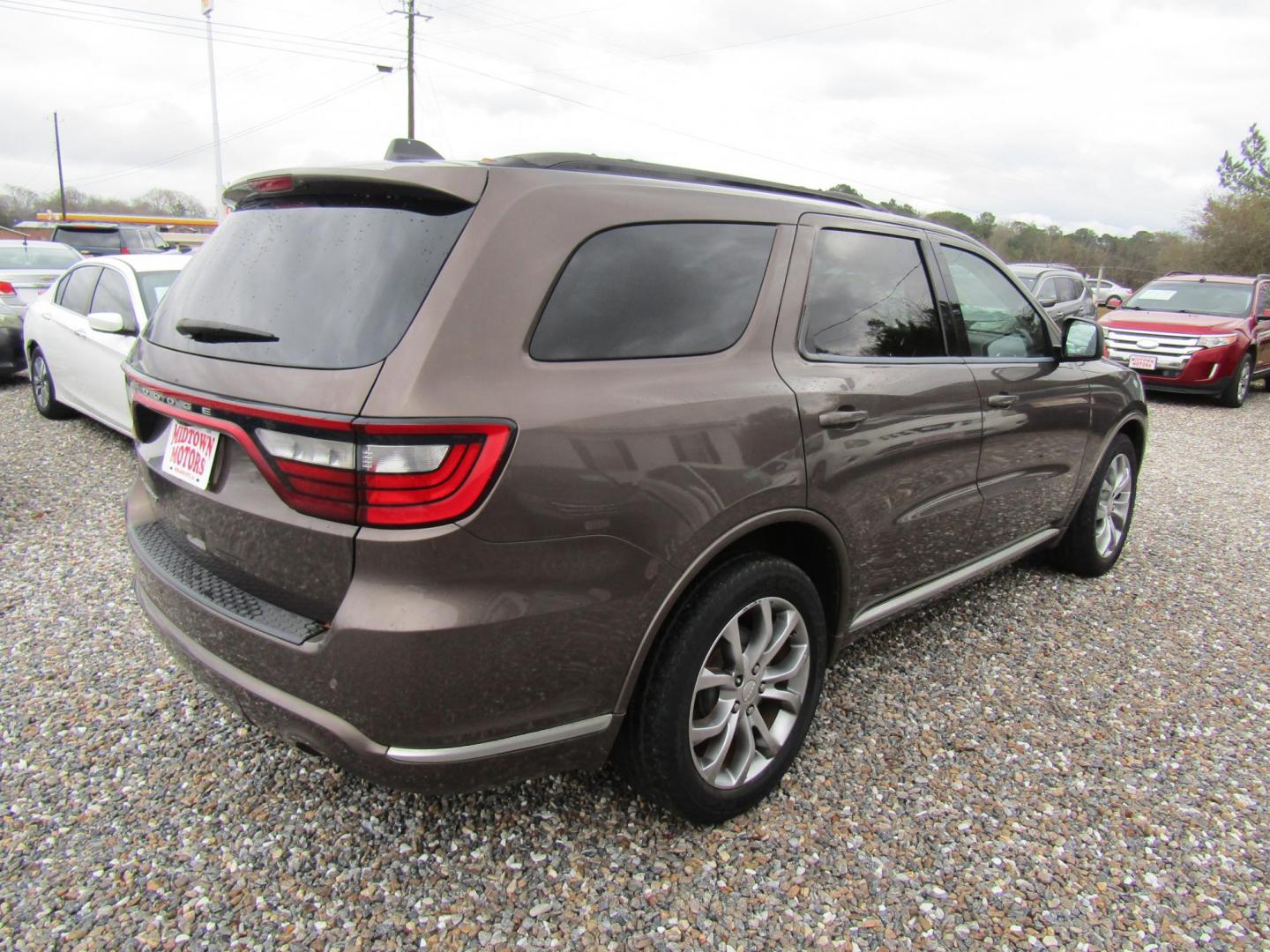 2017 BROWN Dodge Durango SXT RWD (1C4RDHAG2HC) with an 3.6L V6 DOHC 24V engine, Automatic transmission, located at 15016 S Hwy 231, Midland City, AL, 36350, (334) 983-3001, 31.306210, -85.495277 - Photo#7