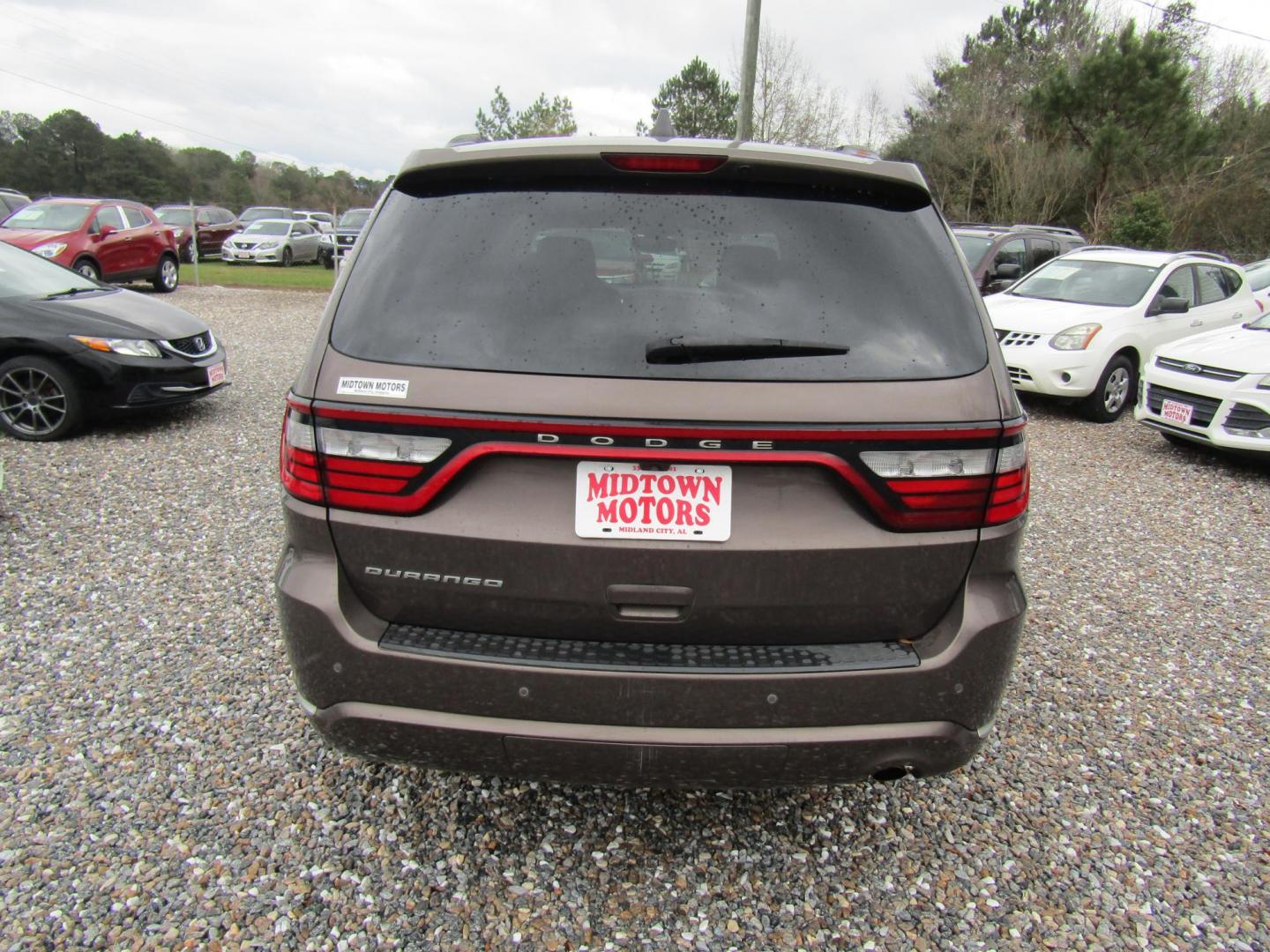 2017 BROWN Dodge Durango SXT RWD (1C4RDHAG2HC) with an 3.6L V6 DOHC 24V engine, Automatic transmission, located at 15016 S Hwy 231, Midland City, AL, 36350, (334) 983-3001, 31.306210, -85.495277 - Photo#6