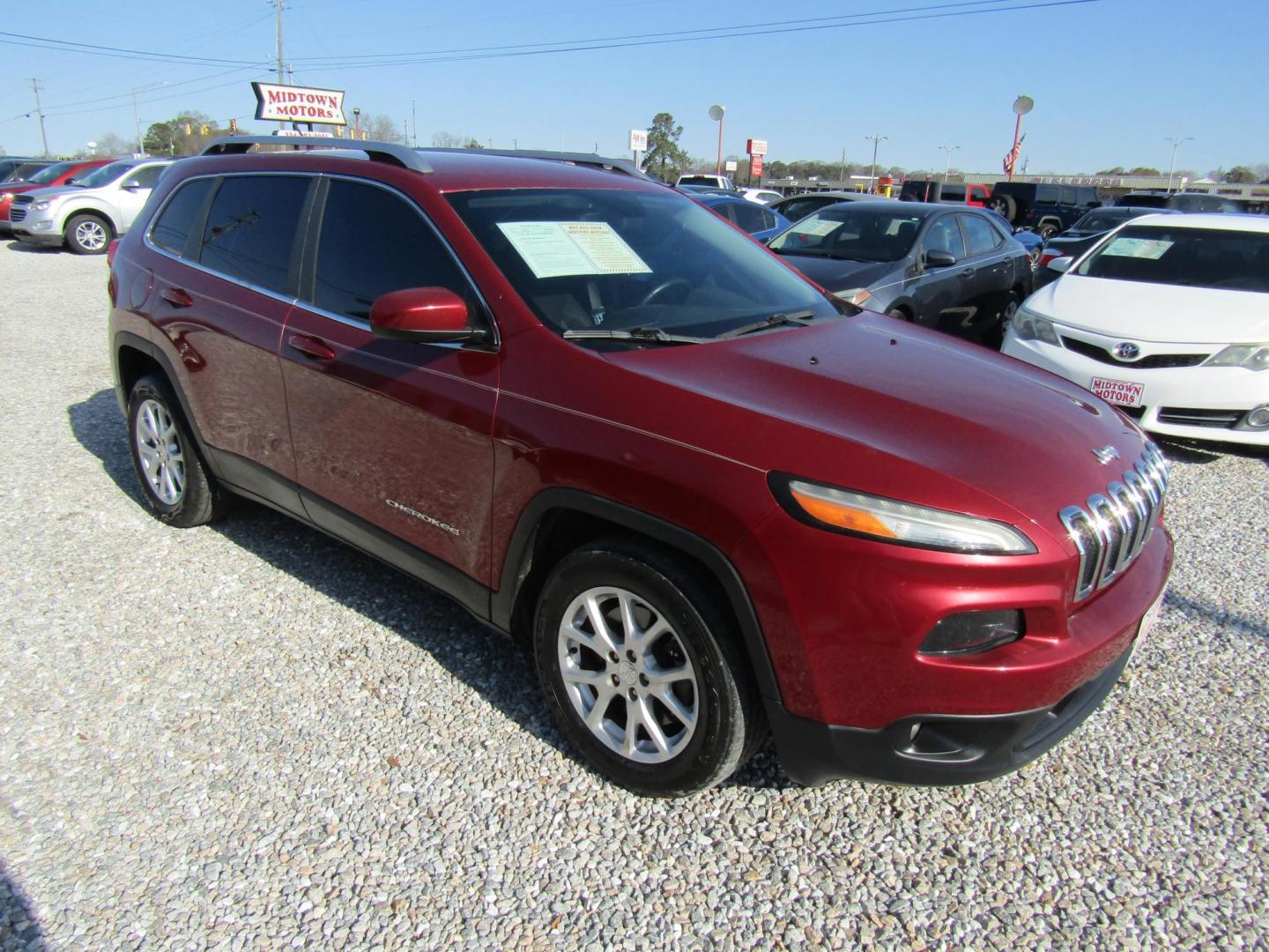 2015 Red Jeep Cherokee Latitude FWD (1C4PJLCS4FW) with an 3.2L V6 DOHC 24V engine, Automatic transmission, located at 15016 S Hwy 231, Midland City, AL, 36350, (334) 983-3001, 31.306210, -85.495277 - Photo#0