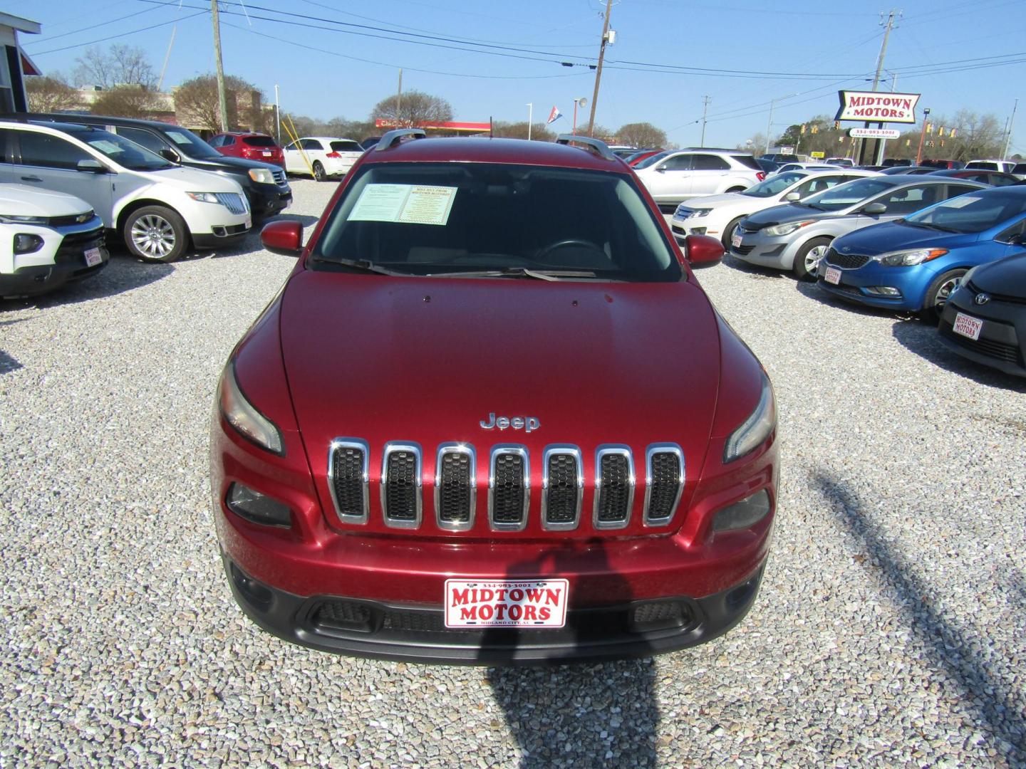 2015 Red Jeep Cherokee Latitude FWD (1C4PJLCS4FW) with an 3.2L V6 DOHC 24V engine, Automatic transmission, located at 15016 S Hwy 231, Midland City, AL, 36350, (334) 983-3001, 31.306210, -85.495277 - Photo#1