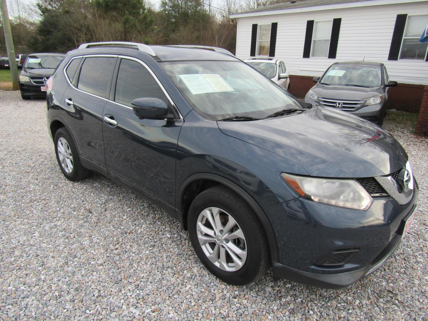 2016 Gray Nissan Rogue S 2WD (5N1AT2MTXGC) with an 2.5L L4 DOHC 16V engine, Automatic transmission, located at 15016 S Hwy 231, Midland City, AL, 36350, (334) 983-3001, 31.306210, -85.495277 - Photo#0