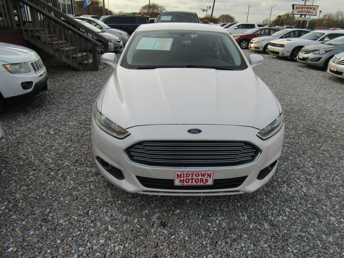 2014 White Ford Fusion SE (3FA6P0H73ER) with an 2.5L L4 DOHC 16V engine, Automatic transmission, located at 15016 S Hwy 231, Midland City, AL, 36350, (334) 983-3001, 31.306210, -85.495277 - Photo#1