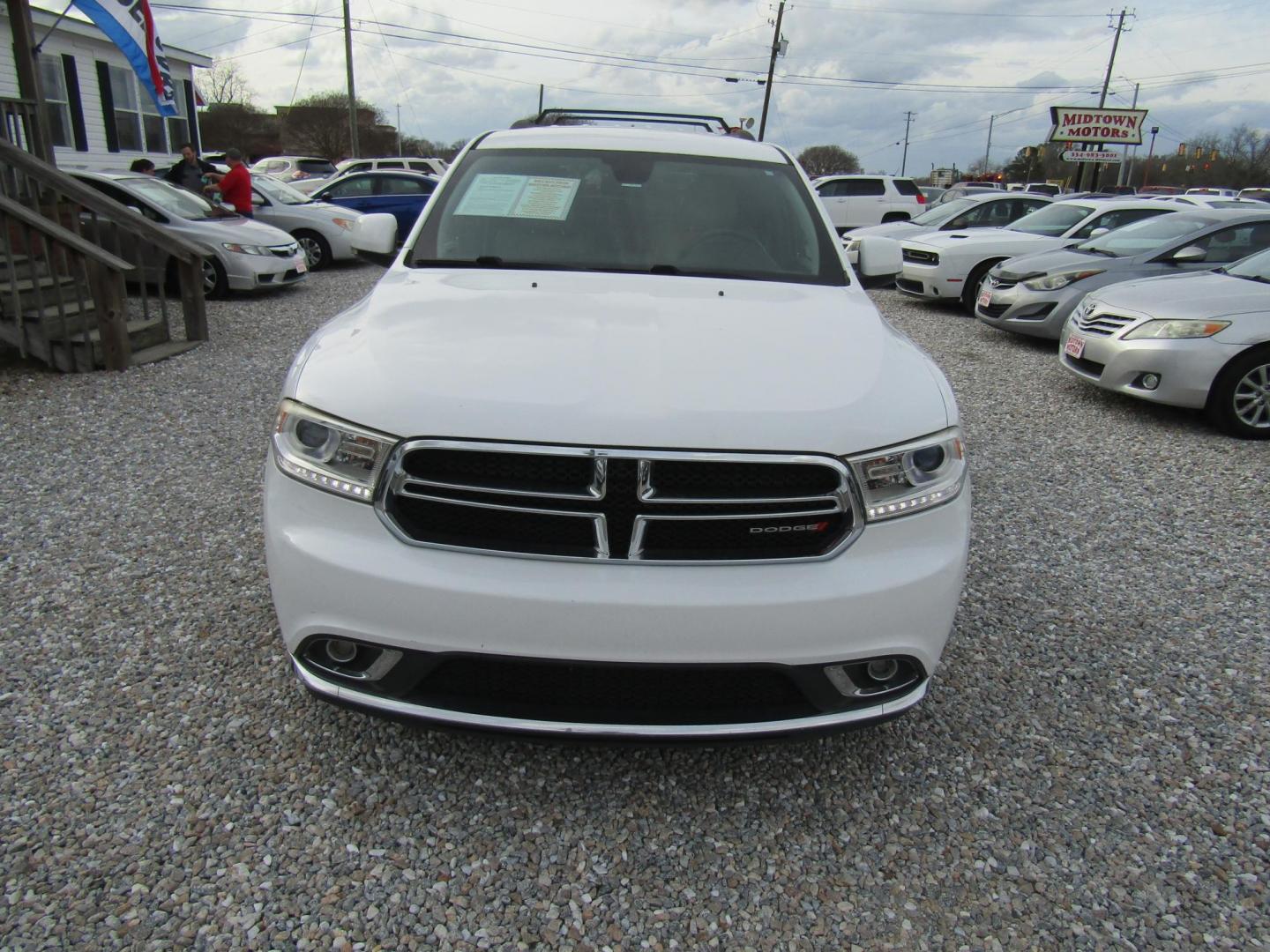 2016 White Dodge Durango Limited 2WD (1C4RDHDG9GC) with an 3.6L V6 DOHC 24V engine, Automatic transmission, located at 15016 S Hwy 231, Midland City, AL, 36350, (334) 983-3001, 31.306210, -85.495277 - Photo#1