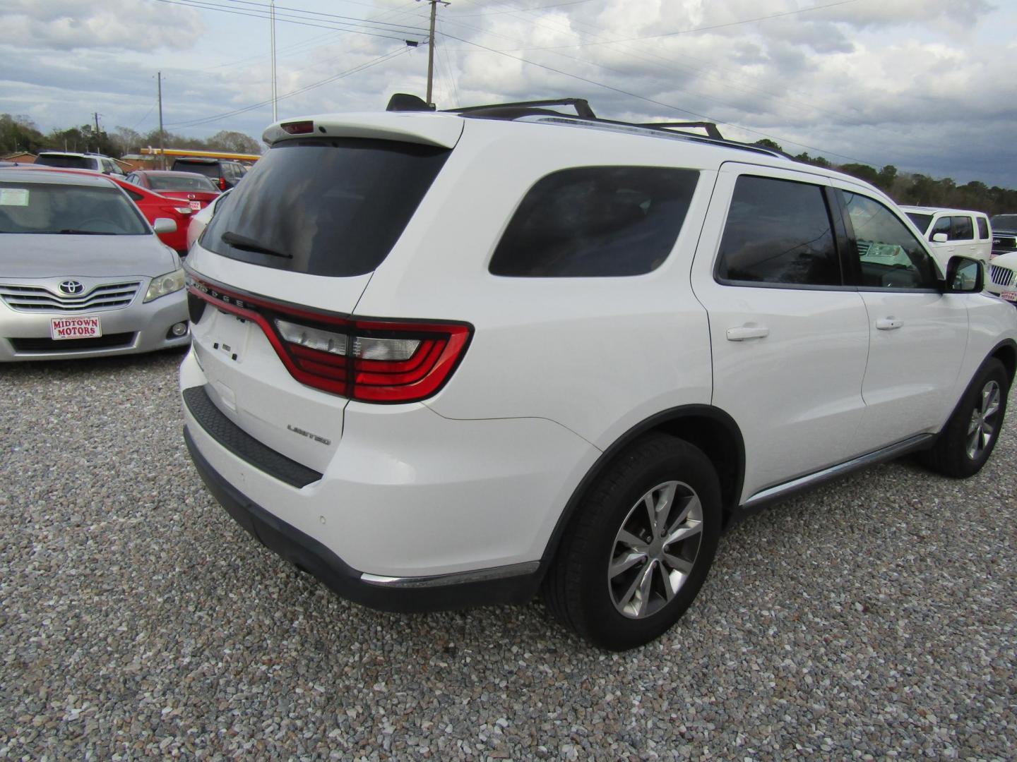 2016 White Dodge Durango Limited 2WD (1C4RDHDG9GC) with an 3.6L V6 DOHC 24V engine, Automatic transmission, located at 15016 S Hwy 231, Midland City, AL, 36350, (334) 983-3001, 31.306210, -85.495277 - Photo#7