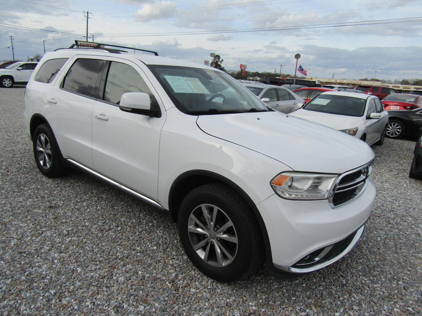2016 White Dodge Durango Limited 2WD (1C4RDHDG9GC) with an 3.6L V6 DOHC 24V engine, Automatic transmission, located at 15016 S Hwy 231, Midland City, AL, 36350, (334) 983-3001, 31.306210, -85.495277 - Photo#0