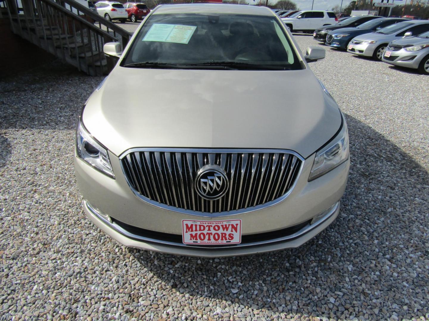 2014 Gold Buick LaCrosse Leather Package (1G4GB5G36EF) with an 3.6L V6 DOHC 24V FFV engine, Automatic transmission, located at 15016 S Hwy 231, Midland City, AL, 36350, (334) 983-3001, 31.306210, -85.495277 - Photo#1