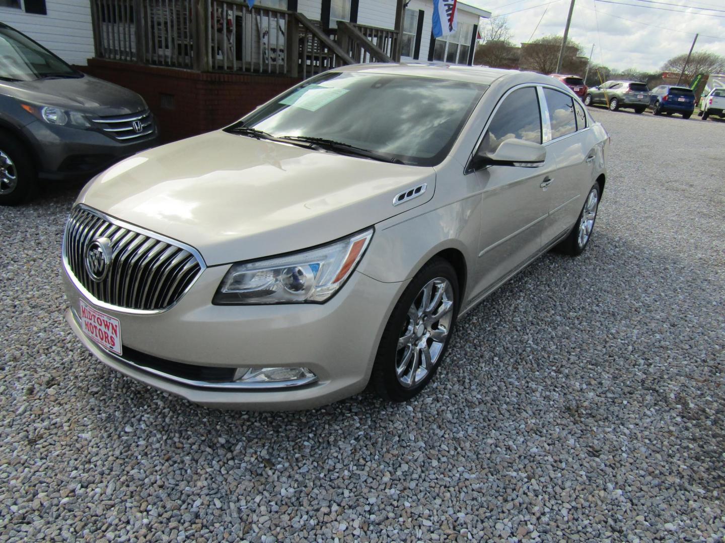 2014 Gold Buick LaCrosse Leather Package (1G4GB5G36EF) with an 3.6L V6 DOHC 24V FFV engine, Automatic transmission, located at 15016 S Hwy 231, Midland City, AL, 36350, (334) 983-3001, 31.306210, -85.495277 - Photo#2