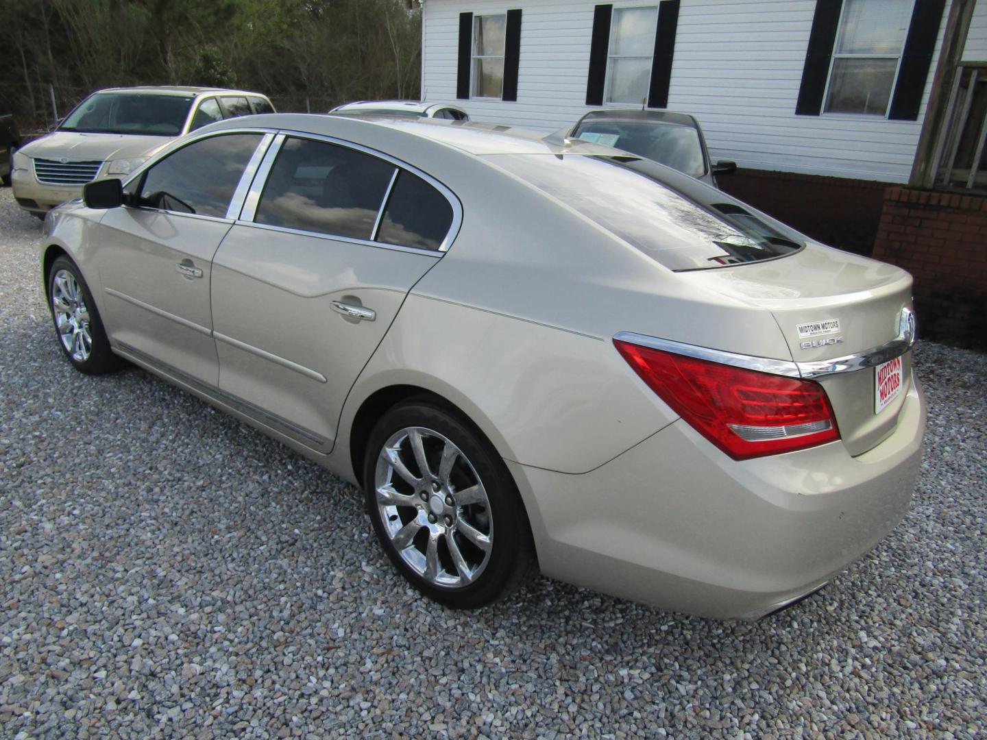 2014 Gold Buick LaCrosse Leather Package (1G4GB5G36EF) with an 3.6L V6 DOHC 24V FFV engine, Automatic transmission, located at 15016 S Hwy 231, Midland City, AL, 36350, (334) 983-3001, 31.306210, -85.495277 - Photo#5