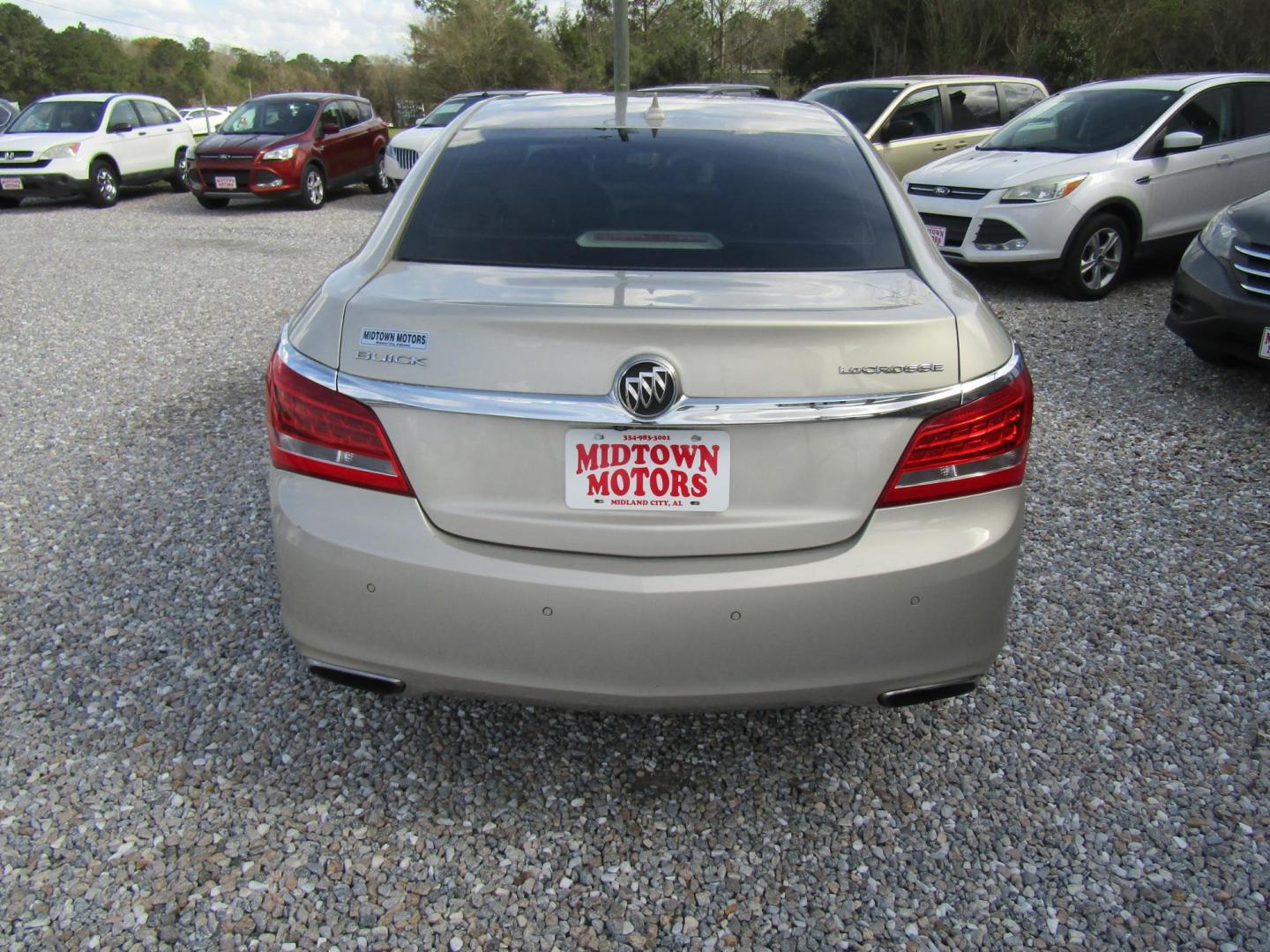 2014 Gold Buick LaCrosse Leather Package (1G4GB5G36EF) with an 3.6L V6 DOHC 24V FFV engine, Automatic transmission, located at 15016 S Hwy 231, Midland City, AL, 36350, (334) 983-3001, 31.306210, -85.495277 - Photo#6