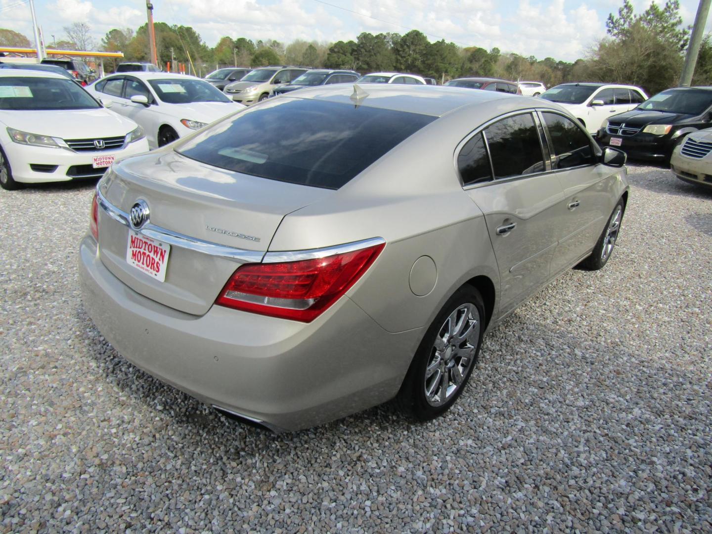 2014 Gold Buick LaCrosse Leather Package (1G4GB5G36EF) with an 3.6L V6 DOHC 24V FFV engine, Automatic transmission, located at 15016 S Hwy 231, Midland City, AL, 36350, (334) 983-3001, 31.306210, -85.495277 - Photo#7