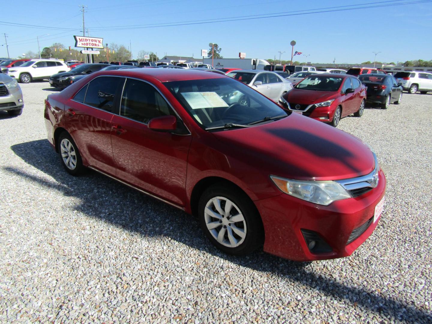 2014 Red Toyota Camry SE (4T1BF1FK3EU) with an 2.5L L4 DOHC 16V engine, Automatic transmission, located at 15016 S Hwy 231, Midland City, AL, 36350, (334) 983-3001, 31.306210, -85.495277 - Photo#0