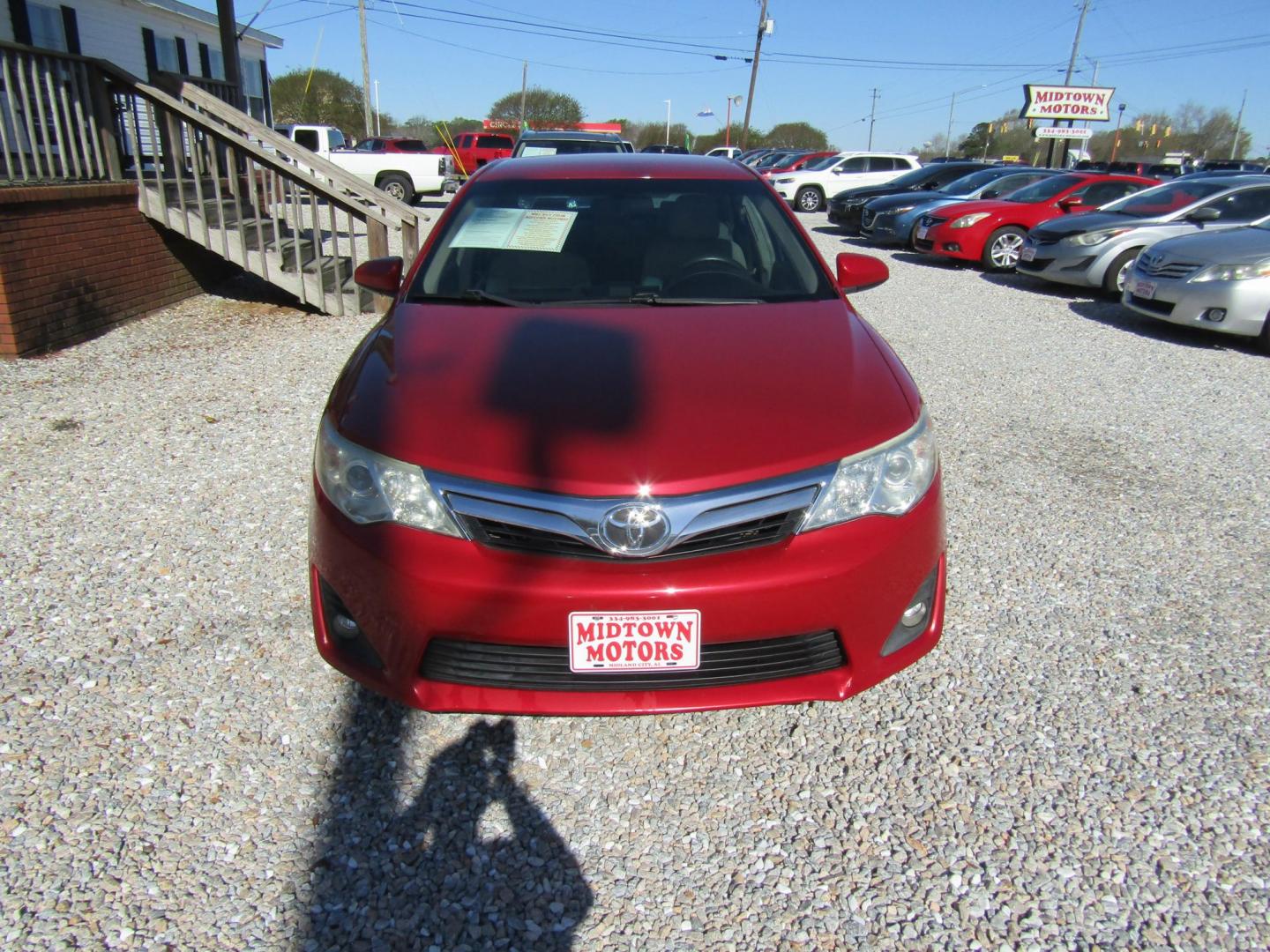2014 Red Toyota Camry SE (4T1BF1FK3EU) with an 2.5L L4 DOHC 16V engine, Automatic transmission, located at 15016 S Hwy 231, Midland City, AL, 36350, (334) 983-3001, 31.306210, -85.495277 - Photo#1