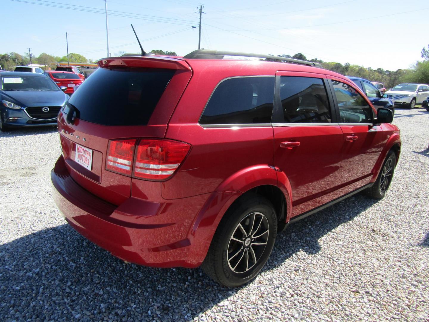 2018 Red Dodge Journey SE (3C4PDCAB5JT) with an 2.4L L4 DOHC 16V engine, Automatic transmission, located at 15016 S Hwy 231, Midland City, AL, 36350, (334) 983-3001, 31.306210, -85.495277 - Photo#7