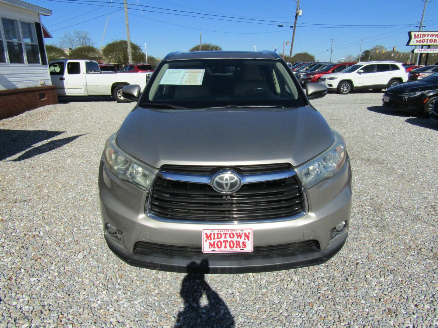 2016 Tan Toyota Highlander (5TDYKRFH4GS) with an 3.5L V6 DOHC 24V engine, Automatic transmission, located at 15016 S Hwy 231, Midland City, AL, 36350, (334) 983-3001, 31.306210, -85.495277 - Photo#1