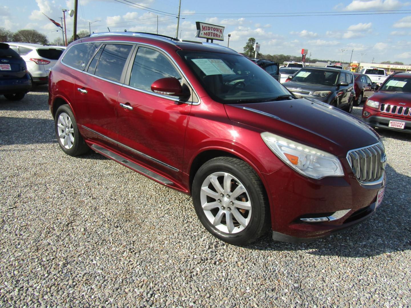 2015 Red Buick Enclave Premium FWD (5GAKRCKD9FJ) with an 3.6L V6 DOHC 24V engine, Automatic transmission, located at 15016 S Hwy 231, Midland City, AL, 36350, (334) 983-3001, 31.306210, -85.495277 - Photo#0
