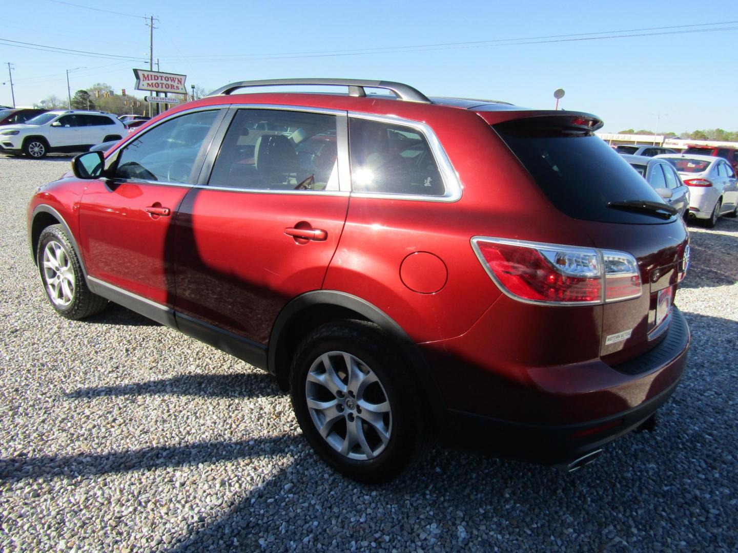 2011 Red Mazda CX-9 Touring (JM3TB2CAXB0) with an 3.7L V6 DOHC 24V engine, Automatic transmission, located at 15016 S Hwy 231, Midland City, AL, 36350, (334) 983-3001, 31.306210, -85.495277 - Photo#2