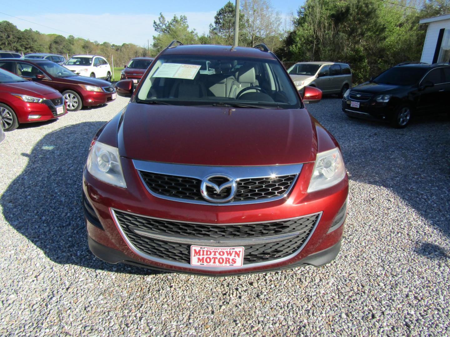 2011 Red Mazda CX-9 Touring (JM3TB2CAXB0) with an 3.7L V6 DOHC 24V engine, Automatic transmission, located at 15016 S Hwy 231, Midland City, AL, 36350, (334) 983-3001, 31.306210, -85.495277 - Photo#1