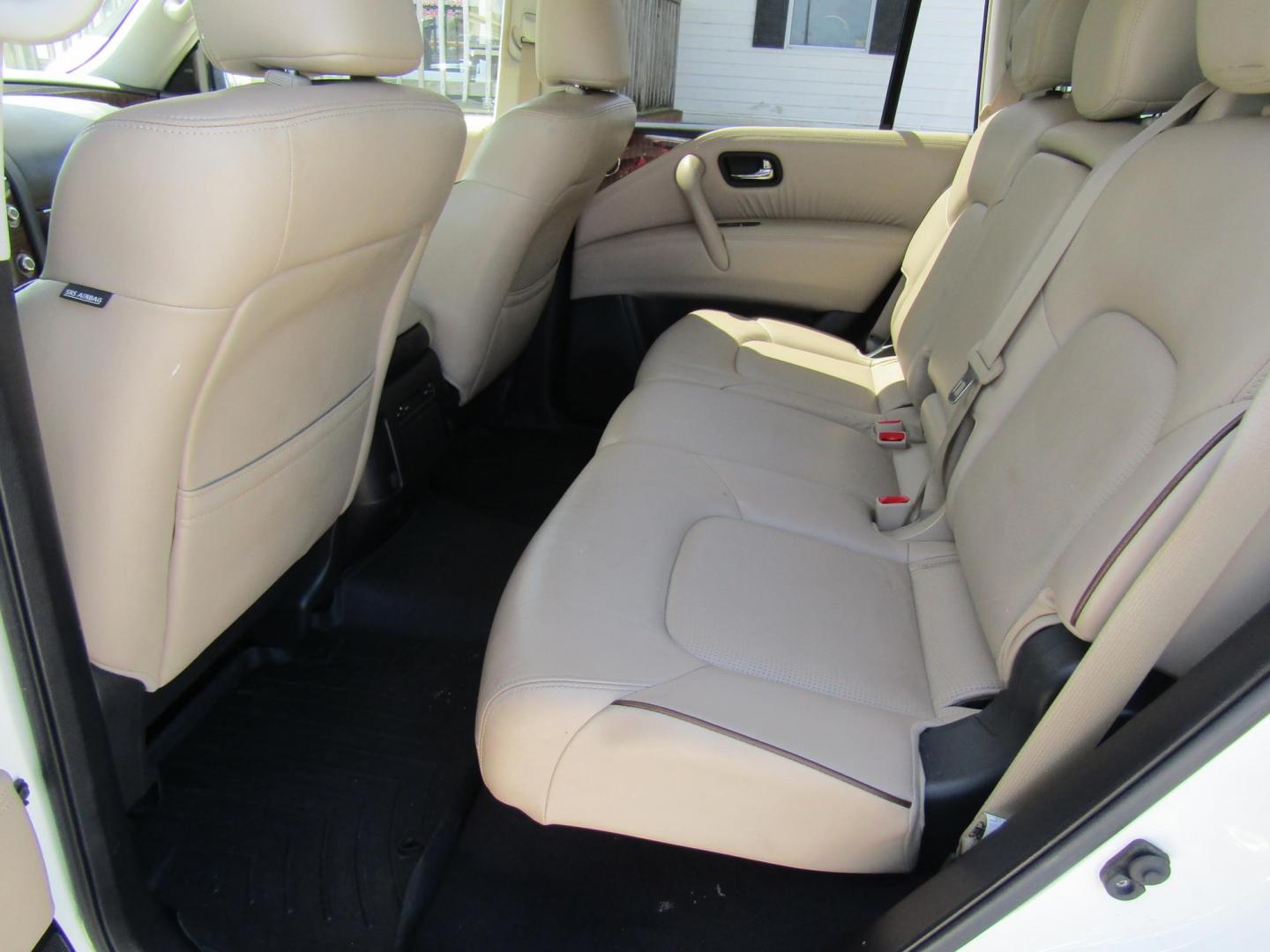 2018 White Nissan Armada Platinum 2WD (JN8AY2ND5J9) with an 5.6L V8 DOHC 32V engine, Automatic transmission, located at 15016 S Hwy 231, Midland City, AL, 36350, (334) 983-3001, 31.306210, -85.495277 - Photo#4