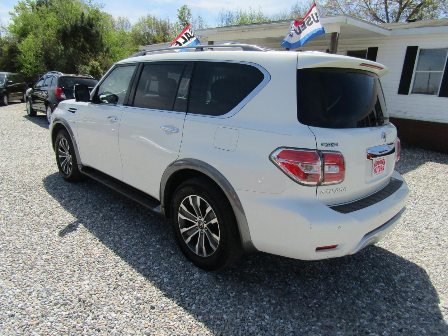 2018 White Nissan Armada Platinum 2WD (JN8AY2ND5J9) with an 5.6L V8 DOHC 32V engine, Automatic transmission, located at 15016 S Hwy 231, Midland City, AL, 36350, (334) 983-3001, 31.306210, -85.495277 - Photo#5